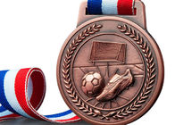 เหรียญกีฬาที่กำหนดเองเคลือบฟันแข็ง / แข็งเหรียญโลหะผสมสังกะสีและริบบิ้นฟุตบอล